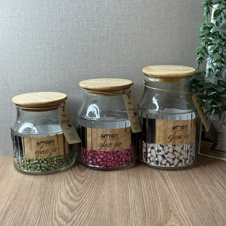 بانکه شیشه‌ای لیمون با درب چوبی، مناسب نگهداری حبوبات، خشکبار، چای، قهوه و مواد غذایی خشک